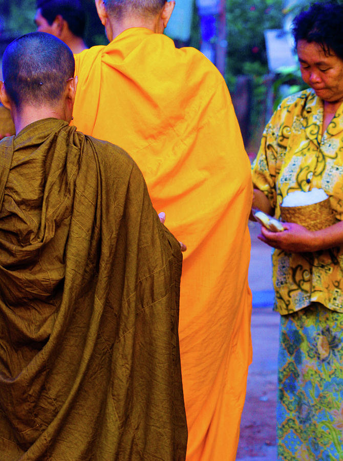 Alms for the monks Photograph by Jeremy Holton