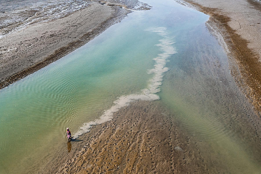 Alone Photograph - Alone In River by Nilendu Banerjee