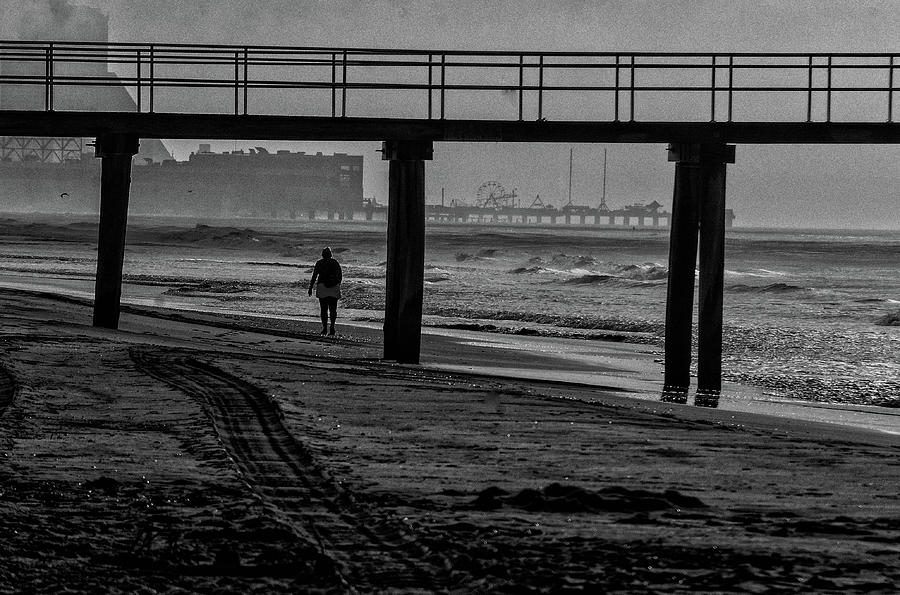 Alone on the beach Photograph by Alan Goldberg