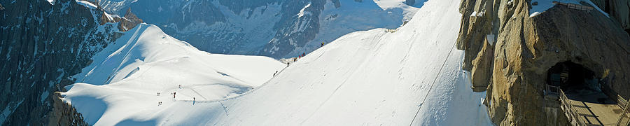 Alps Mountaineers Setting Off Into High Photograph by Fotovoyager