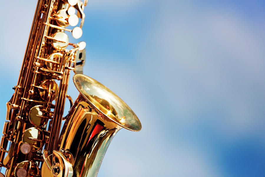 Alto Sax Close Up Against Sky With Photograph by Rapideye