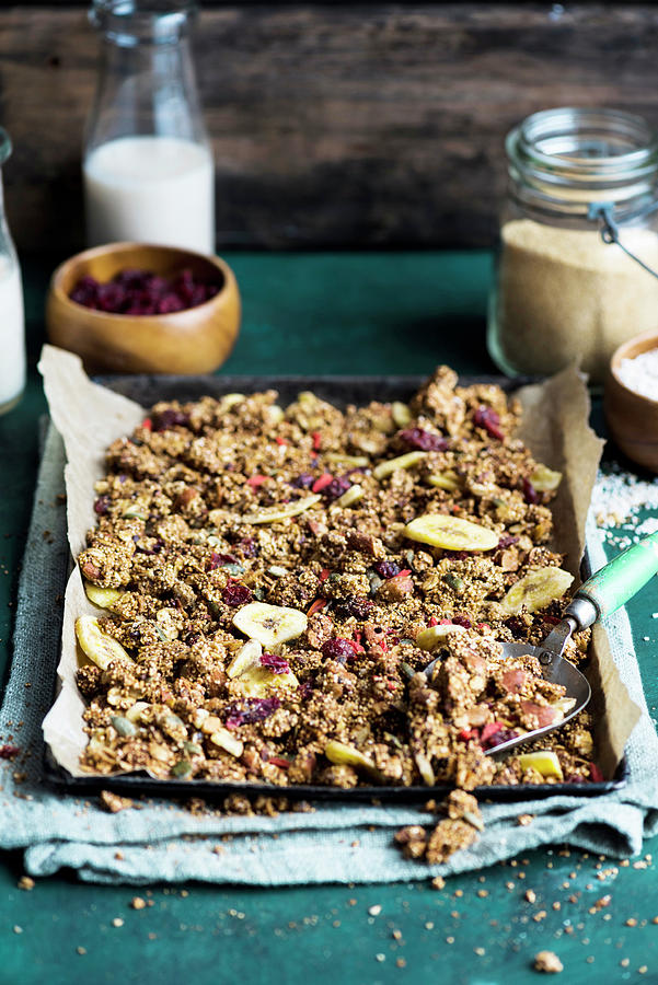 Amaranth And Nutbutter Granola With Dried Fruit On A Baking Tray vegan Photograph by Great Stock!
