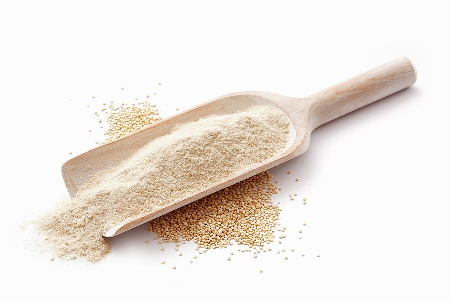 Amaranth Flour In A Wooden Scoop Photograph by Petr Gross