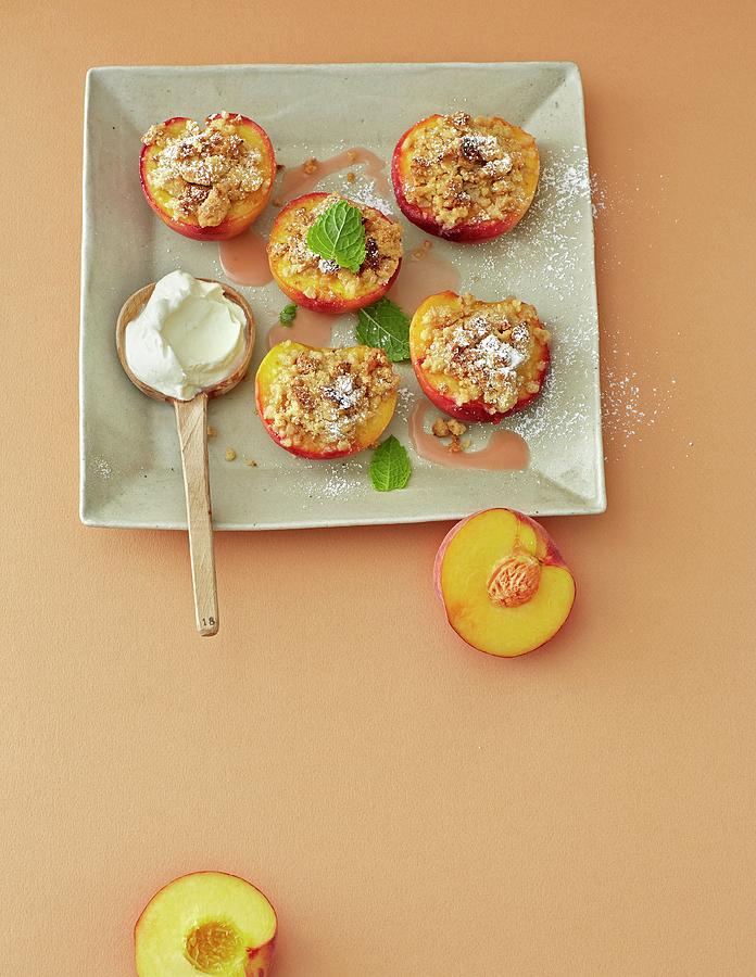 Amaretti Crumble With Peaches Photograph by Jalag / Julia Hoersch