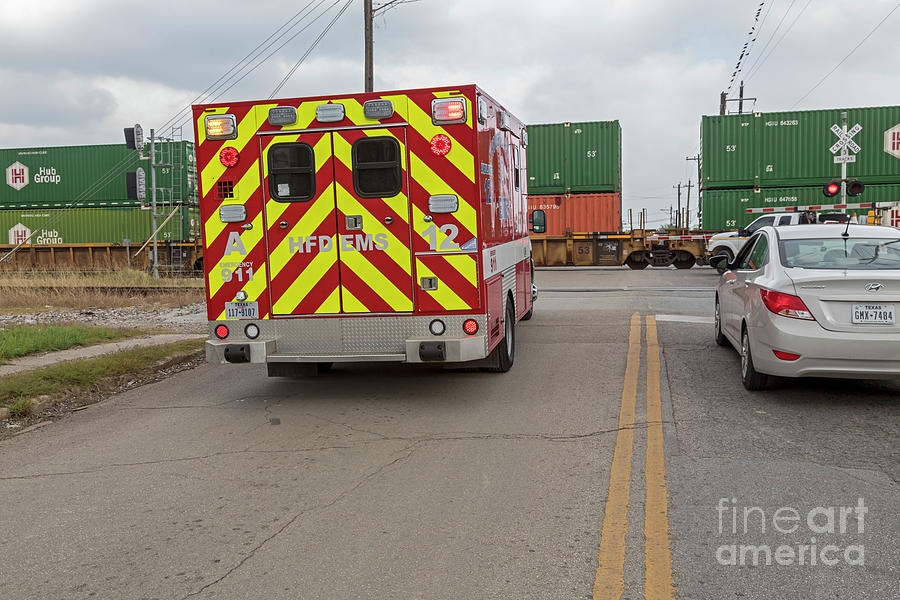 Ambulance Waiting At Level Crossing Photograph by Jim West/science Photo Library
