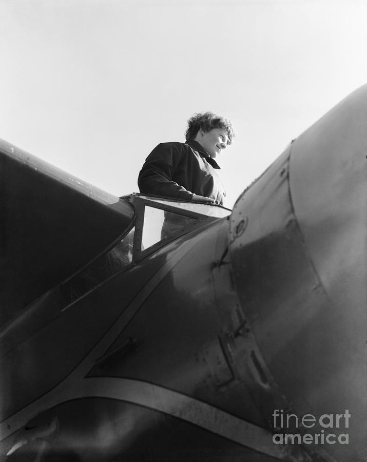 Airplane Photograph - Amelia Earhart In Her Planes Cockpit by Bettmann