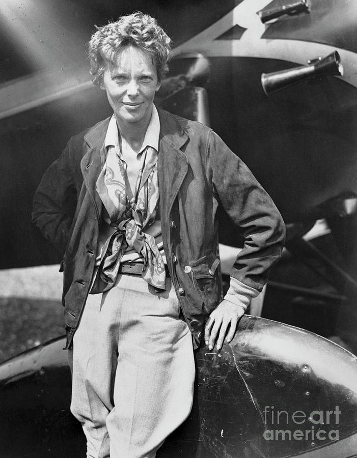 Newark Photograph - Amelia Earhart Leaning On Airplane by Bettmann