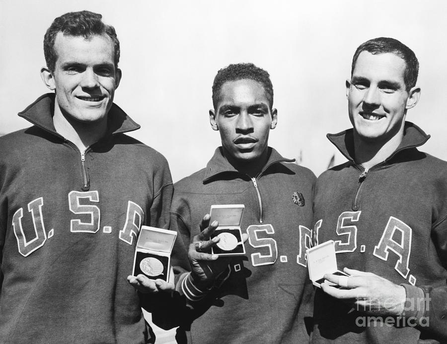 American Athletes With Olympic Medals Photograph by Bettmann