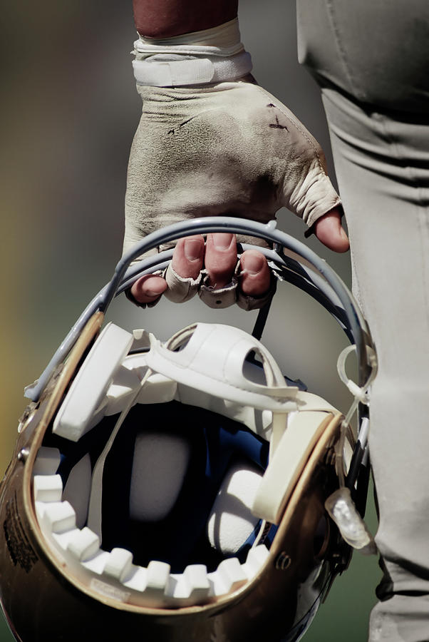 American Football Player Carrying Helmet Photograph by David Madison