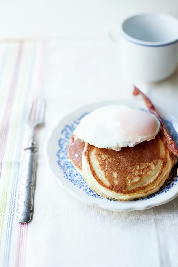 American Pancakes With A Poached Egg Photograph by Rika Manabe Photography