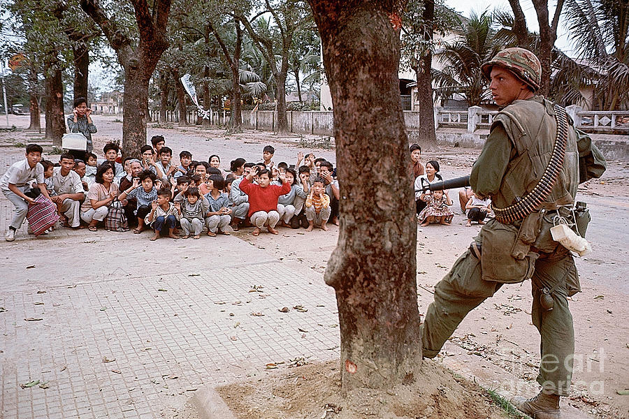 American Soldier Guards Refugees Photograph by Bettmann