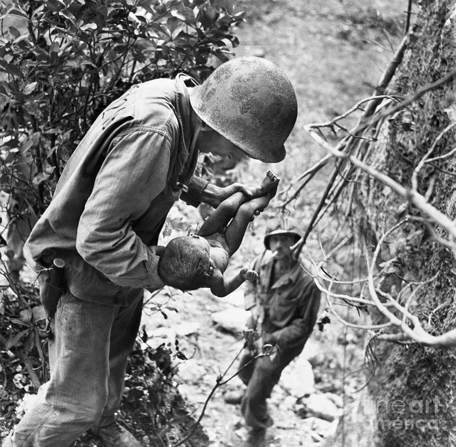 American Soldier Holding Japanese Infant Photograph by Bettmann