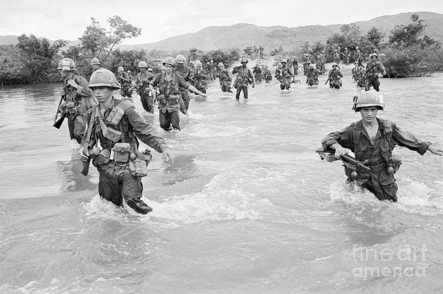 American Troops Wading Across River Photograph by Bettmann