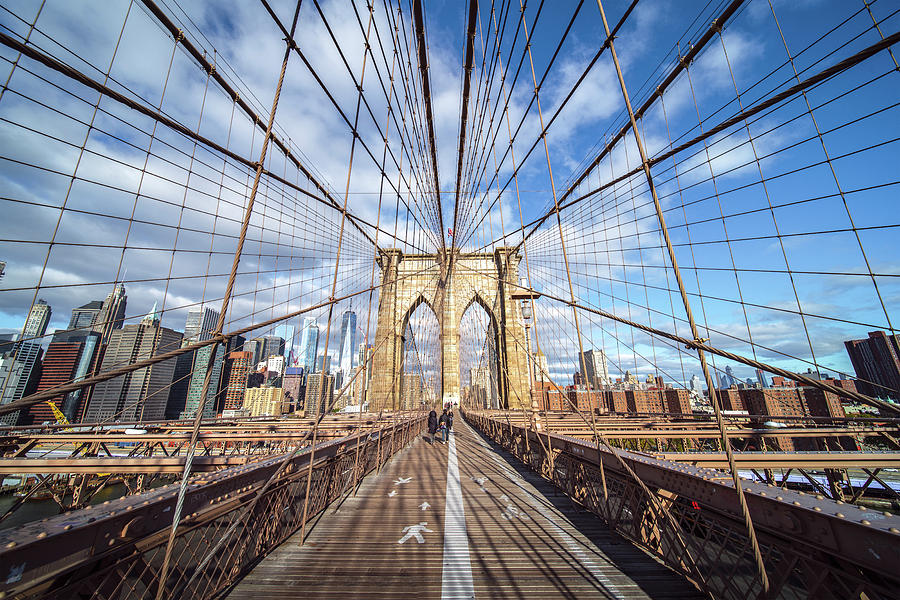 American walk on the Brooklyn bridge  Photograph by Anek Suwannaphoom