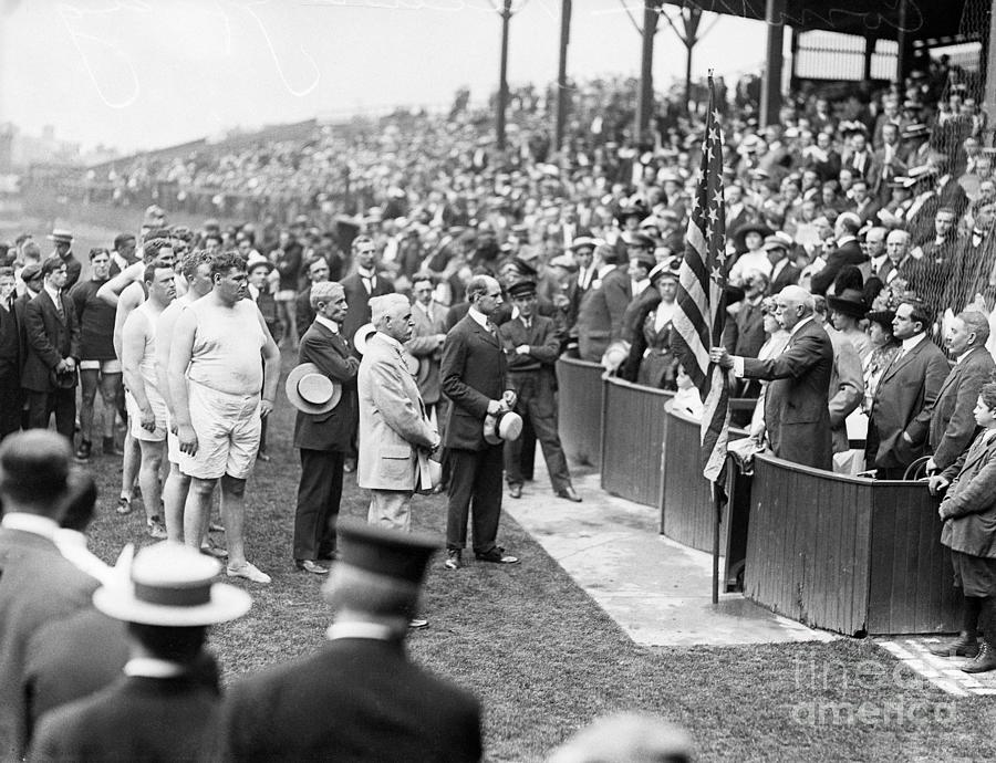 Athlete Photograph - Americans About To Receive Flag by Bettmann
