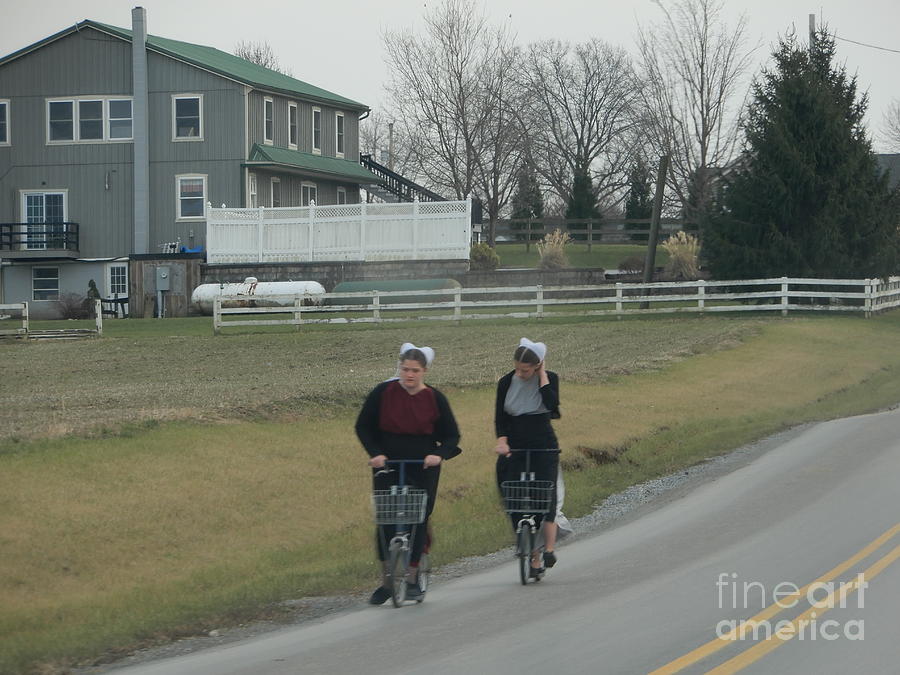 Amish Friends Go for a Scooter Ride Photograph by Christine Clark