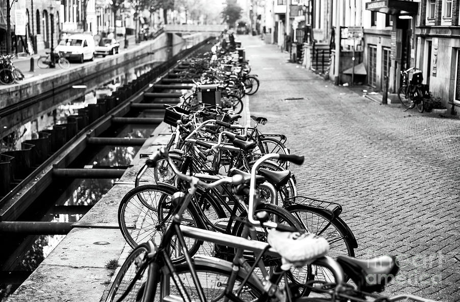 Amsterdam Bikes in a Row Photograph by John Rizzuto