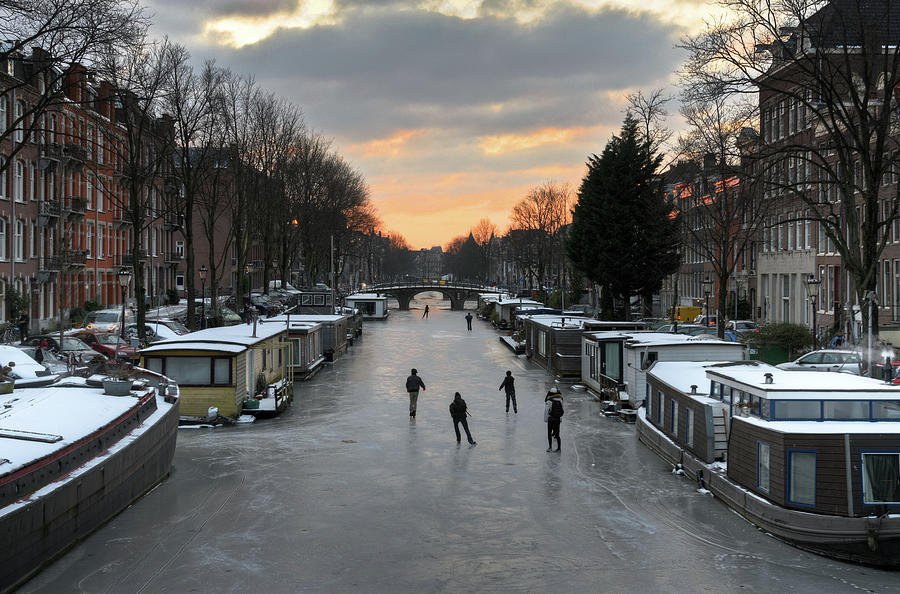 Amsterdam Canal Ice Skating Photograph by Roevin