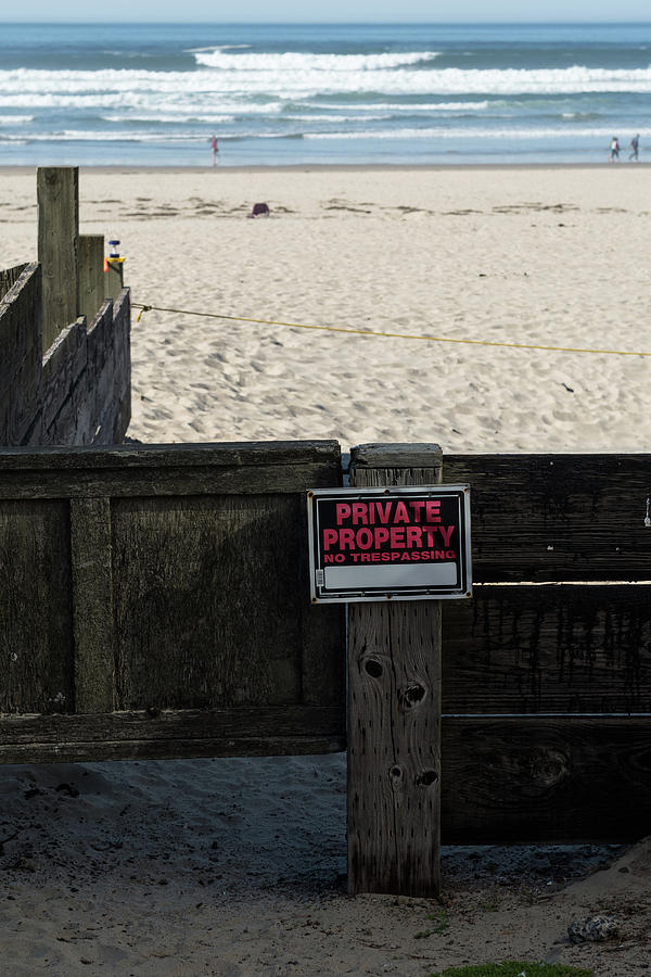 An Aged Private Property Sign In Front Of The Beach Sand In Cannon Beach, Oregon, Usa. Photograph