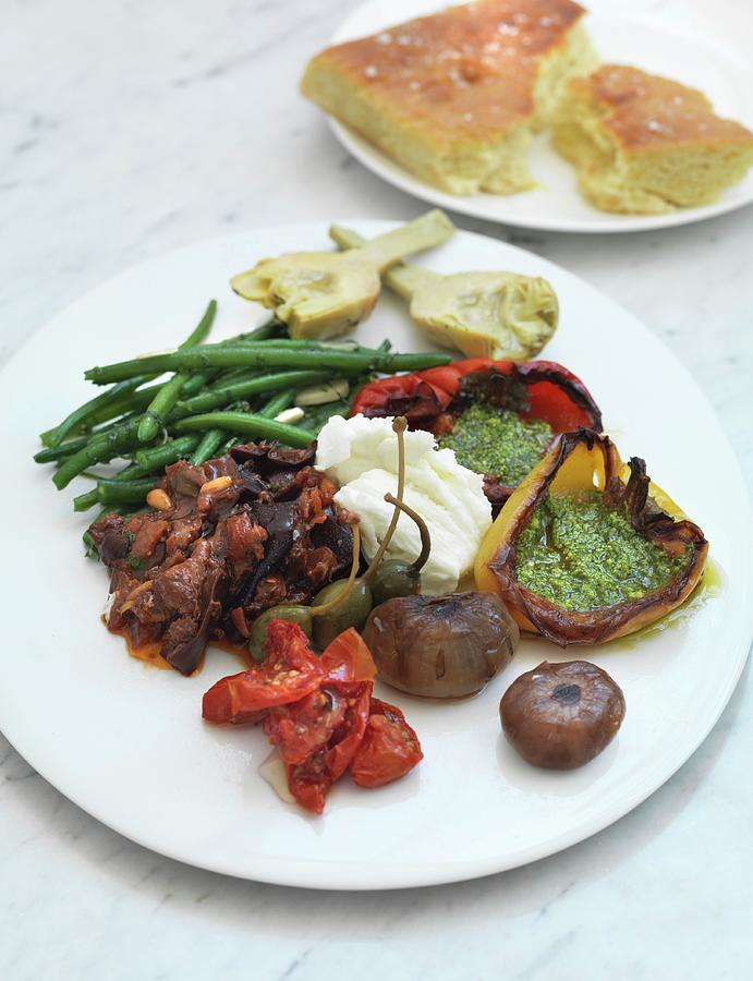 An Antipasti Platter With Vegetables And Mozzarella Photograph by Hugh Johnson