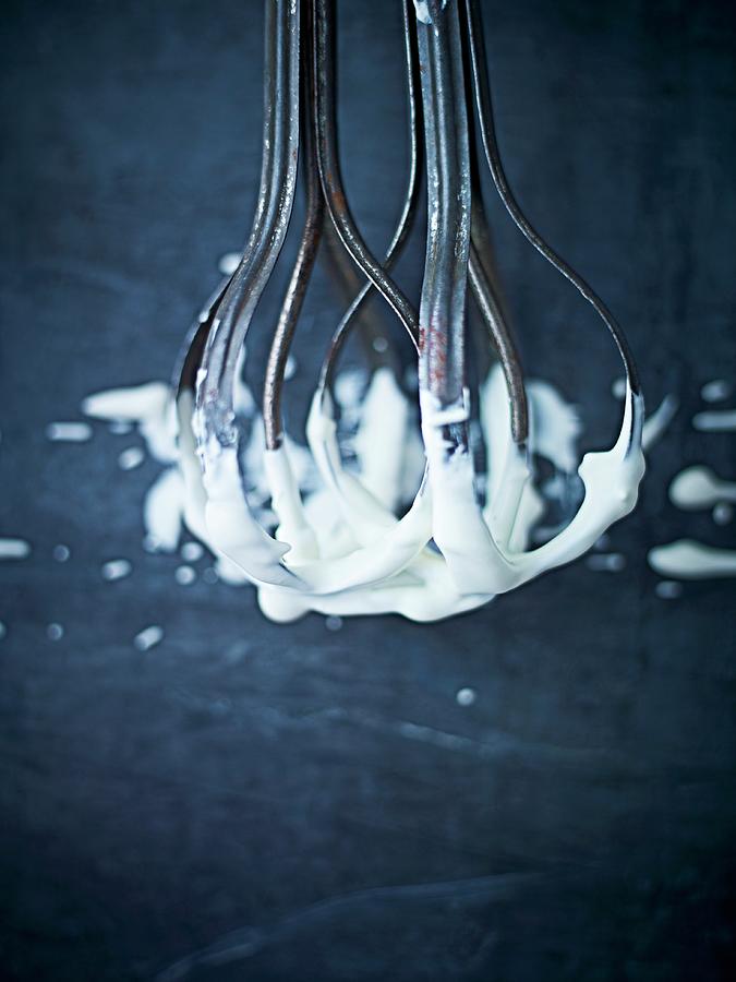 An Antique Hand Whisk With Cream On It Photograph by Myles New