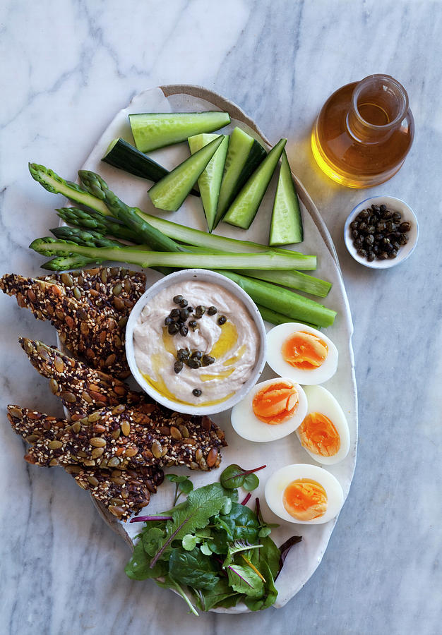 An Appetizer Platter With Crackers, Vegetables, Eggs And A Tuna Fish Dip keto Cuisine Photograph by Louise Hammond