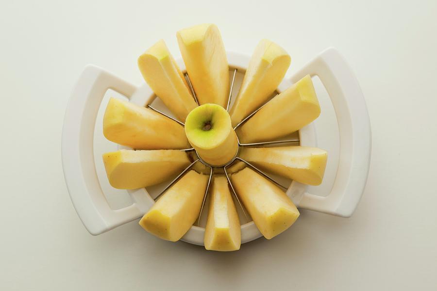 An Apple In An Apple Slicer Photograph by William Boch