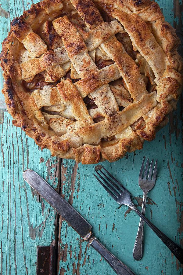 An Apple Pie And Old Cutlery seen From Above Photograph by Vfoodphotography