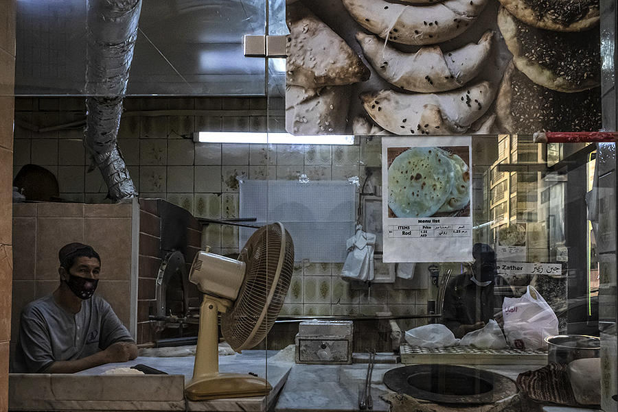 Bread Photograph - An Arabic Bread Shop by Souvik Banerjee