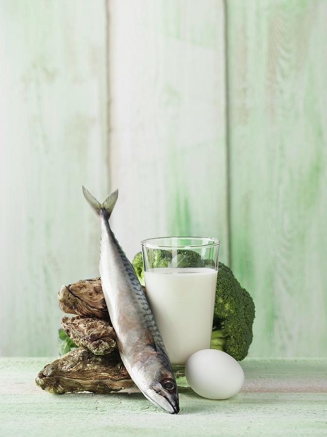 An Arrangement Featuring Oysters, Mackerel, Milk, Egg And Broccoli Photograph by Armin Zogbaum