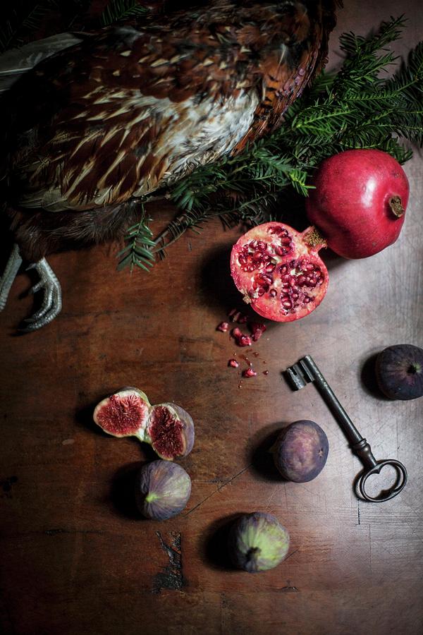 An Arrangement Featuring Pheasant, Pomegranates And Figs Photograph by Helen Cathcart