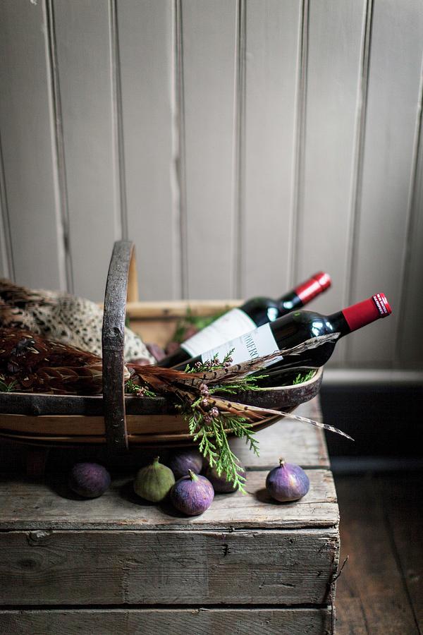 An Arrangement Featuring Pheasant, Red Wine And Figs Photograph by Helen Cathcart