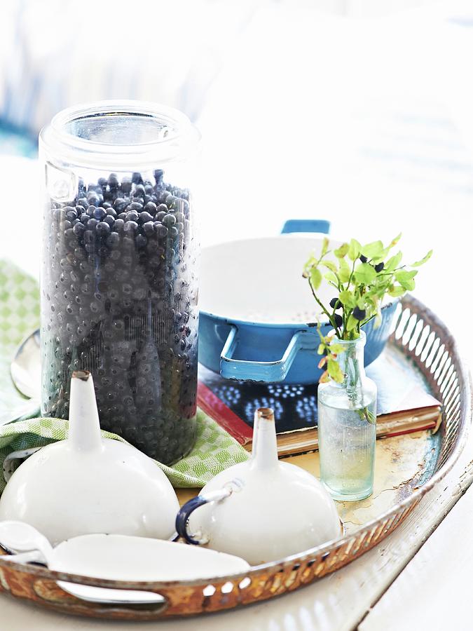 An Arrangement Of Cake Utensils And Blueberries In A Jar Photograph by Hannah Kompanik