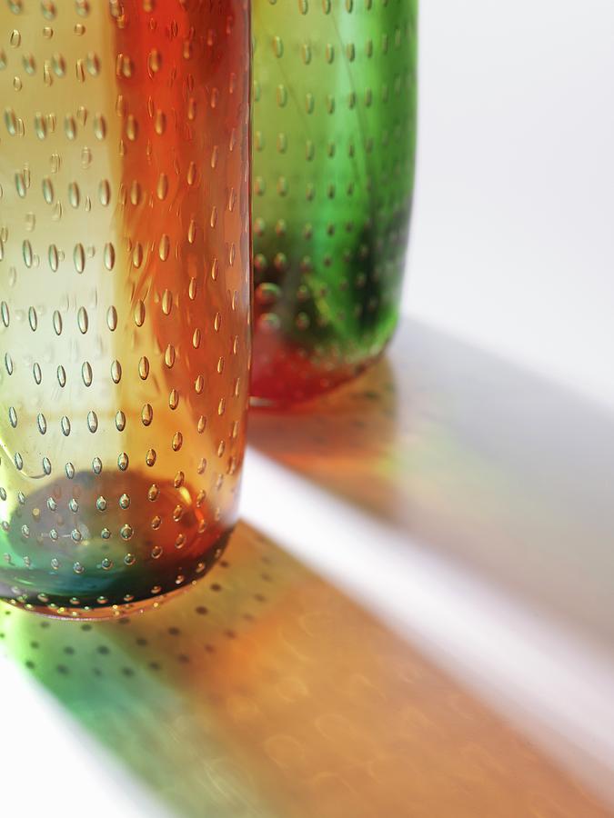 An Arrangement Of Coloured Glass Vases With Air Bubbles Photograph by Armin Zogbaum