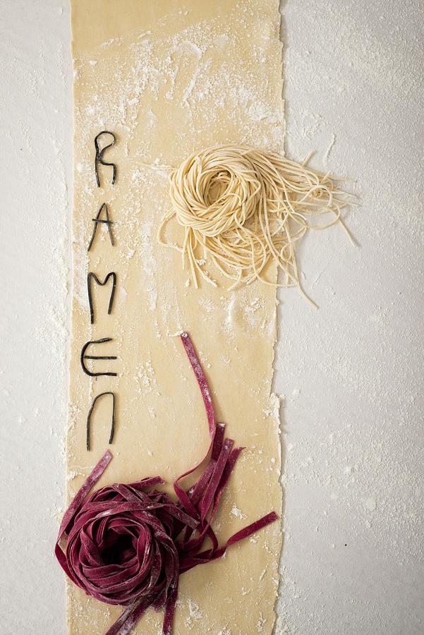 An Arrangement Of Fresh Noodles And The Word Ramen Photograph by Great Stock!