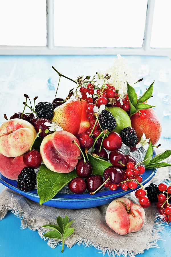 An Arrangement Of Fruit And Berries Photograph by Atelier Hmmerle