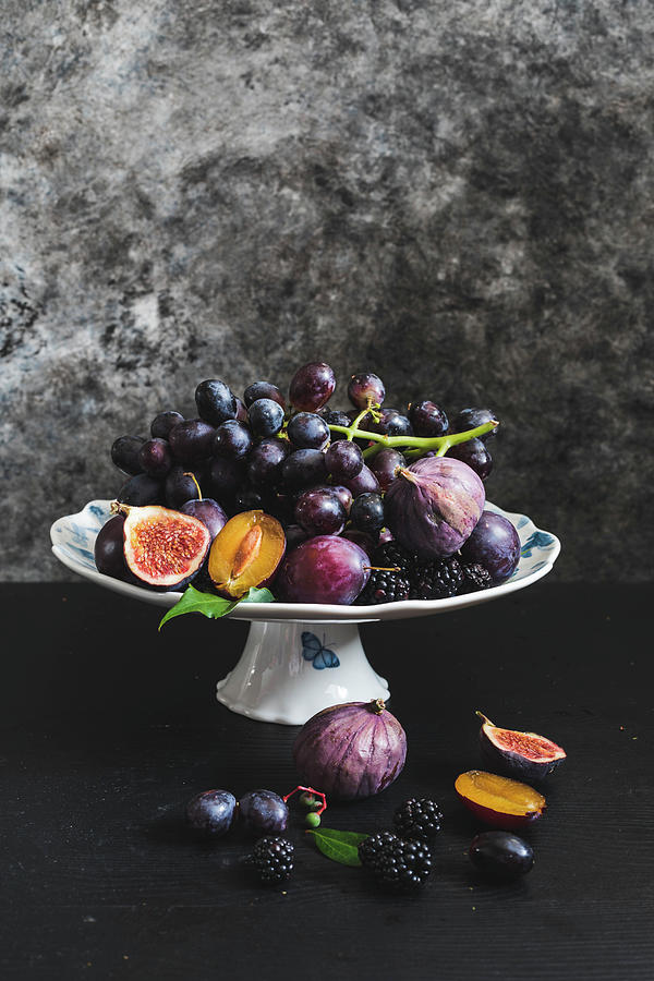 An Arrangement Of Grapes, Figs And Plums Photograph by Lilia Jankowska