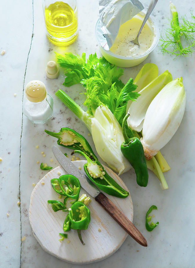 An Arrangement Of Ingredients With Chicory, Fennel, Peperoni, Yoghurt And Olive Oil Photograph by Udo Einenkel