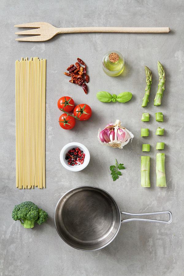 An Arrangement Of Kitchen Utensils And Ingredients For Pasta Dishes Photograph by Claudia Castaldi