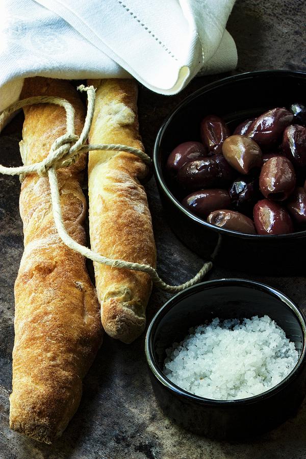 An Arrangement Of Olive Bread, Olive And Sea Salt Photograph by Charlotte Von Elm