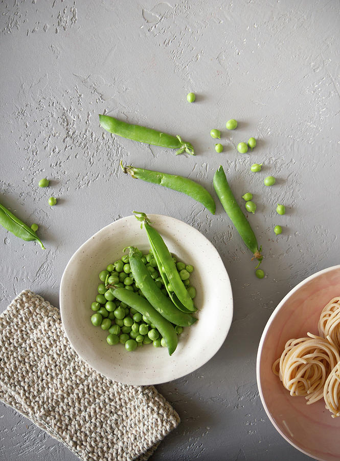 An Arrangement Of Peas And Pea Pods Photograph by Patricia Miceli