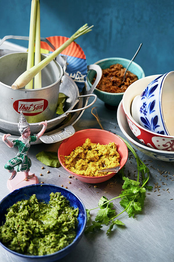 An Arrangement Of Thai Curry Pastes, Lemongrass And Coriander Photograph by Thorsten Suedfels / Stockfood Studios