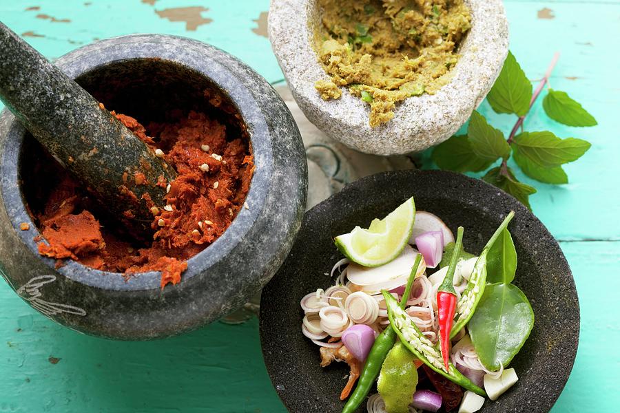 An Arrangement Of Thai Spices With Red And Green Curry Paste Photograph by Eising Studio - Food Photo & Video