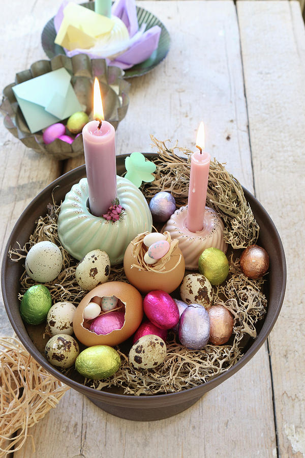 An Arrangement Of Various Easter Eggs, Quails Eggs And Burning Candles Photograph by Regina Hippel