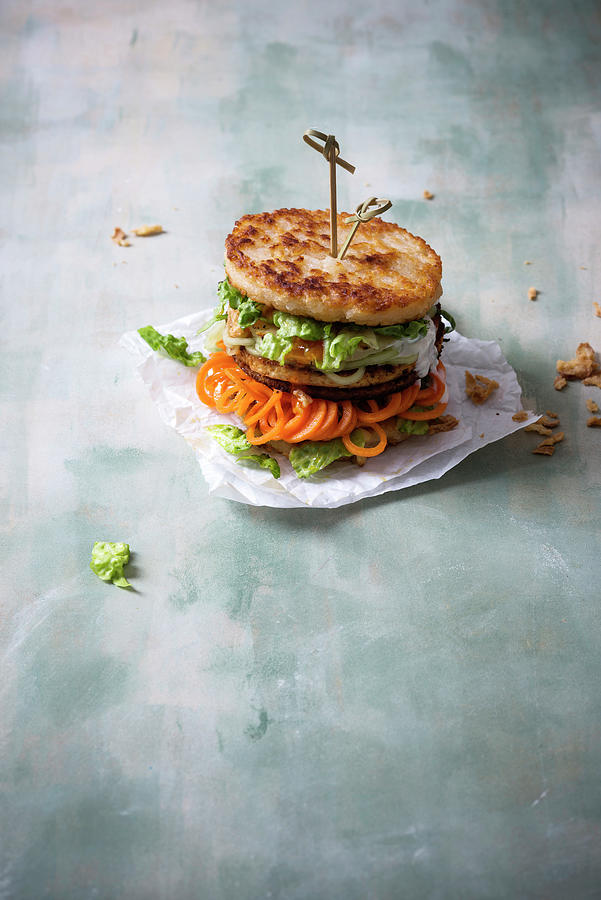 An Asian Style Burger With Tofu, Grilled Pineapple And Vegetable Spirals A Sticky Rice Bun vegan Photograph by Kati Neudert