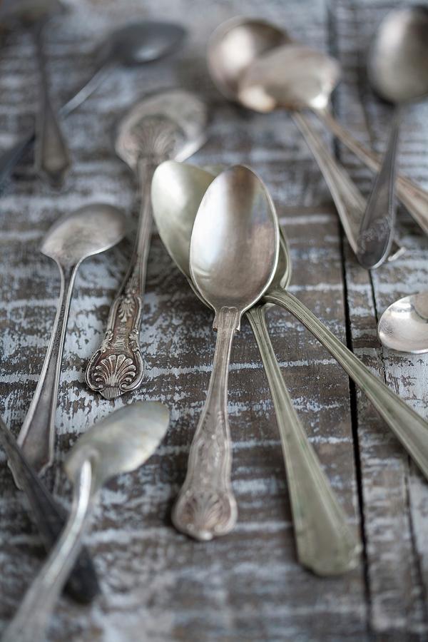 An Assortment Of Silver Spoons Photograph by Martina Schindler