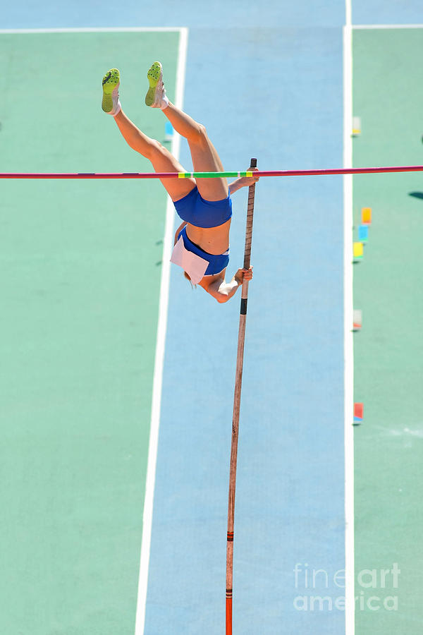 Woman Photograph - An Athlete Attempts Successful A Pole by Maxisport Woman Photograph - An Athlete Attempts Successful A Pole by Maxisport