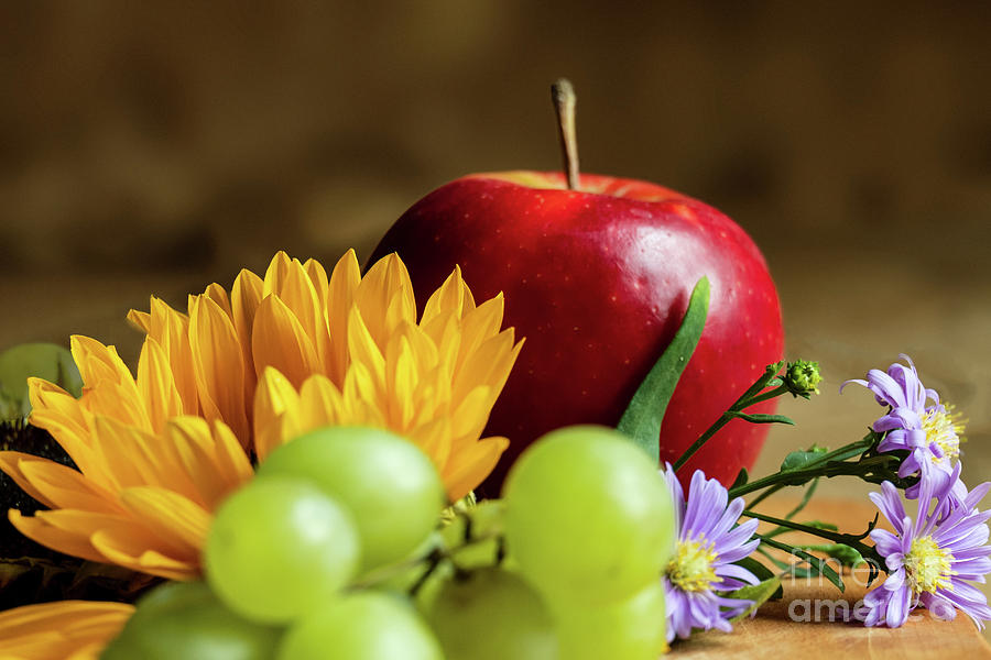 An autumn gifts still life on the blurred background Photograph by Marina Usmanskaya