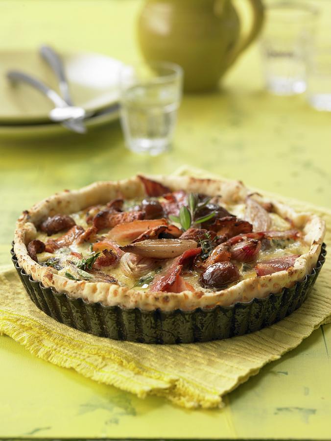 An Autumnal Tart With Chestnuts, Onions And Bacon Photograph by Jan-peter Westermann