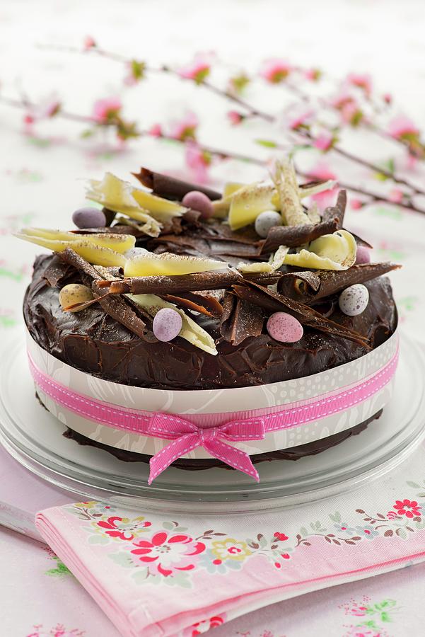 An Easter Cake With Chocolate Glaze And Sugared Eggs Photograph by Jonathan Short